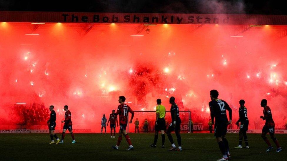 Smoke could be seen billowing out of the stands at Dens Park