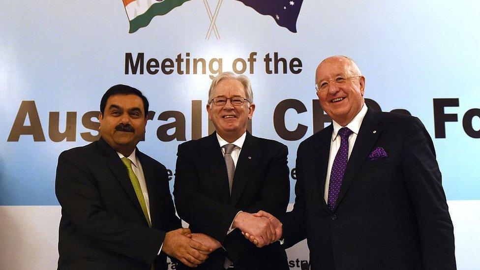 Adani founder Gautam Adani (left) with Australia's then Trade Minister Andrew Robb and Rio Tinto's ex-CEO Sam Walsh in 2015