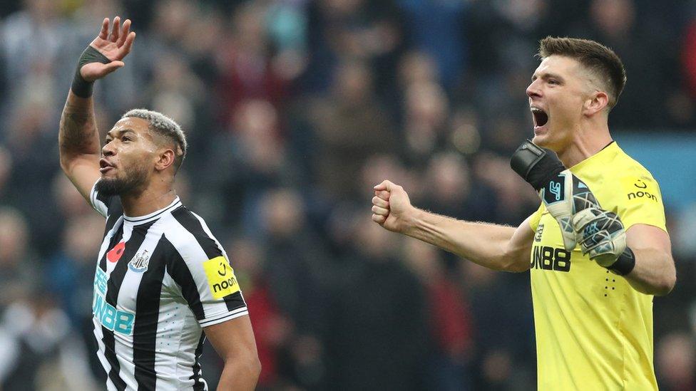 Newcastle United's Joelinton and Nick Pope celebrate