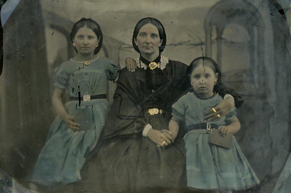 Hand-coloured photograph of Hannah Porter with her daughters, Sarah and Susanna in 1862