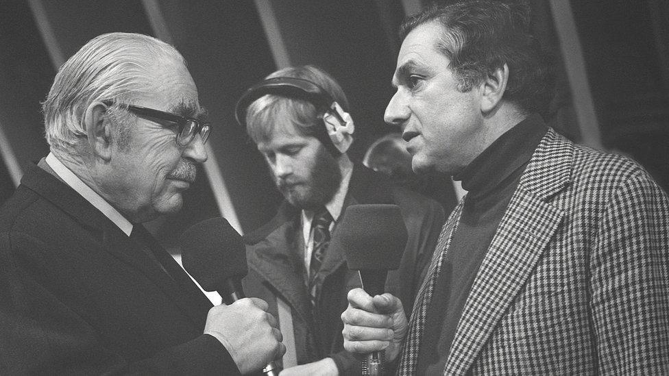 BBC radio broadcaster John Snagge interviews Sir Ken Adam