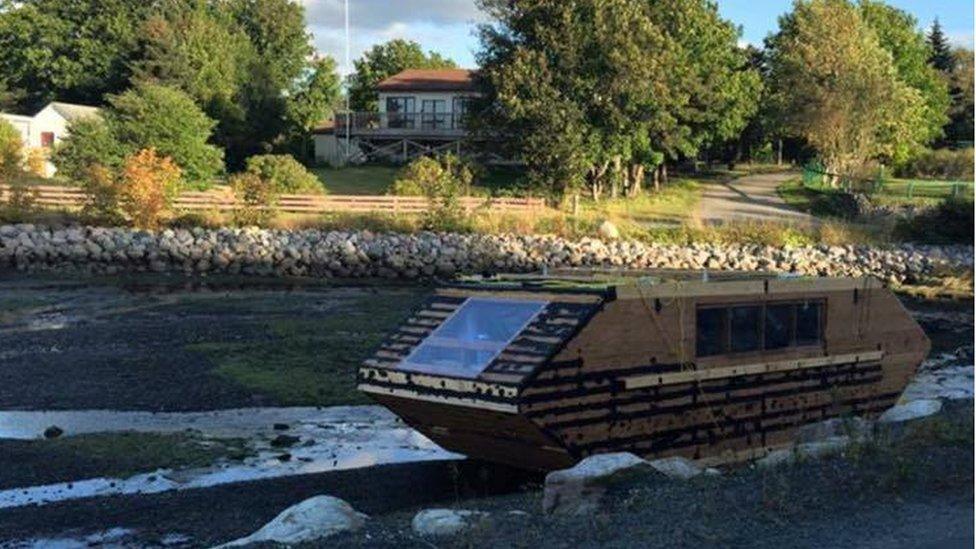 boat docked in rocks 2015