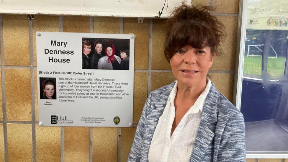 Alison Taylor, Mary Denness's daughter, with a plaque honouring her mother