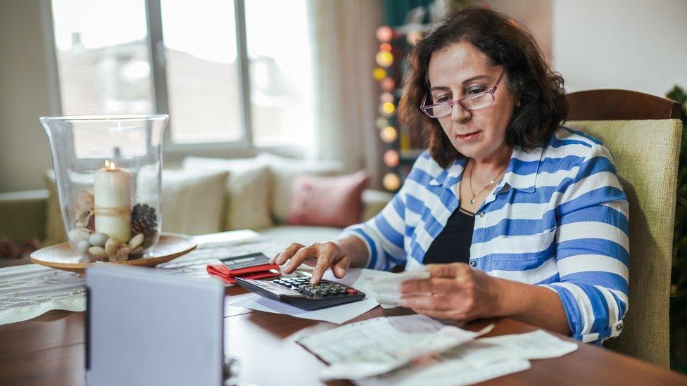 Woman working out her budget