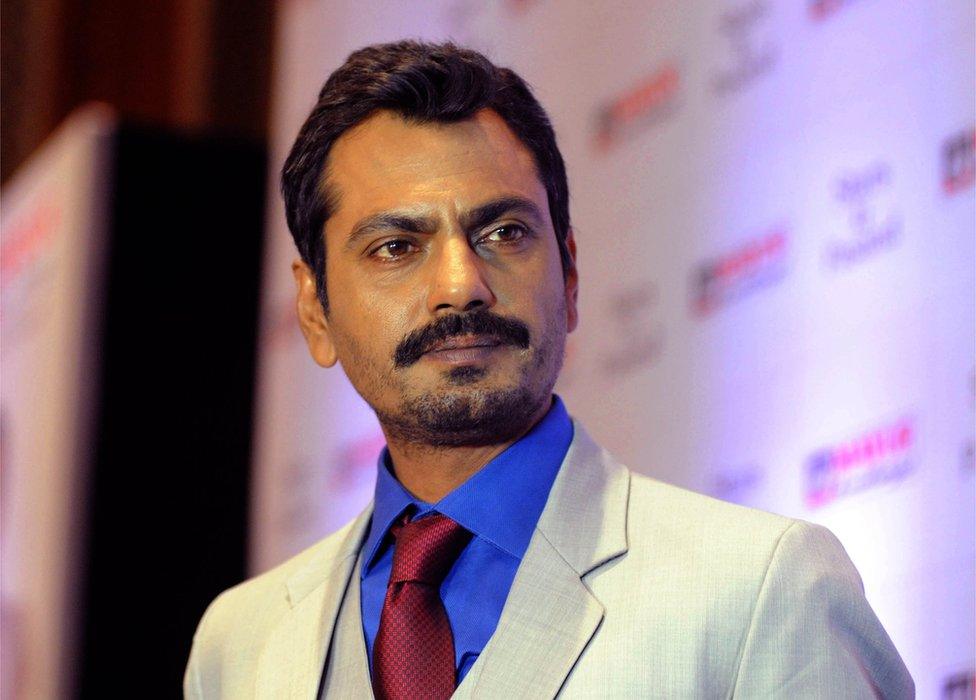 Indian Bollywood actor Nawazuddin Siddiqui poses at the press conference announcing him as new ambassador of Mayur Suitings in Mumbai on October 6, 2015