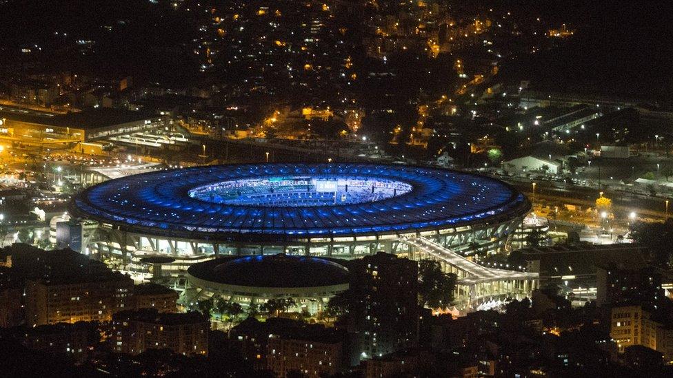 The Maracana Stadium is seen lit up ahead of the 2016 Summer Olympic Games on July 31, 2016 in Rio de Janeiro, Brazil.