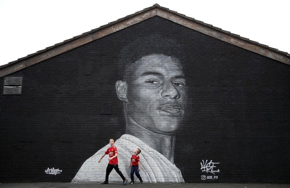 A mural of Manchester United striker Marcus Rashford by Street artist Akse on the wall of the Coffee House Cafe on Copson Street, Withington. 8 November 2020.