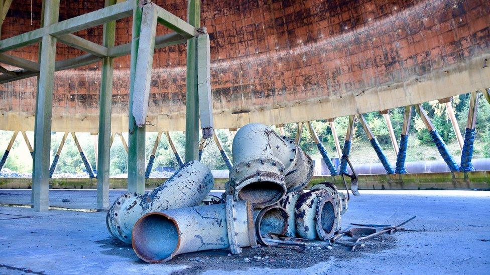 Rusting pipes in a cooling tower