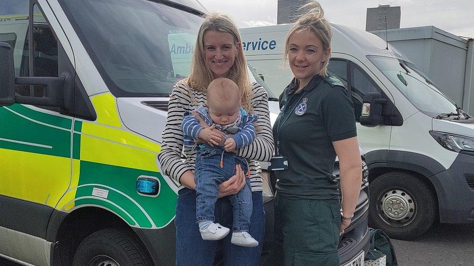 Mum Alex with baby Fraser and ambulance service call handler Lorna Milward