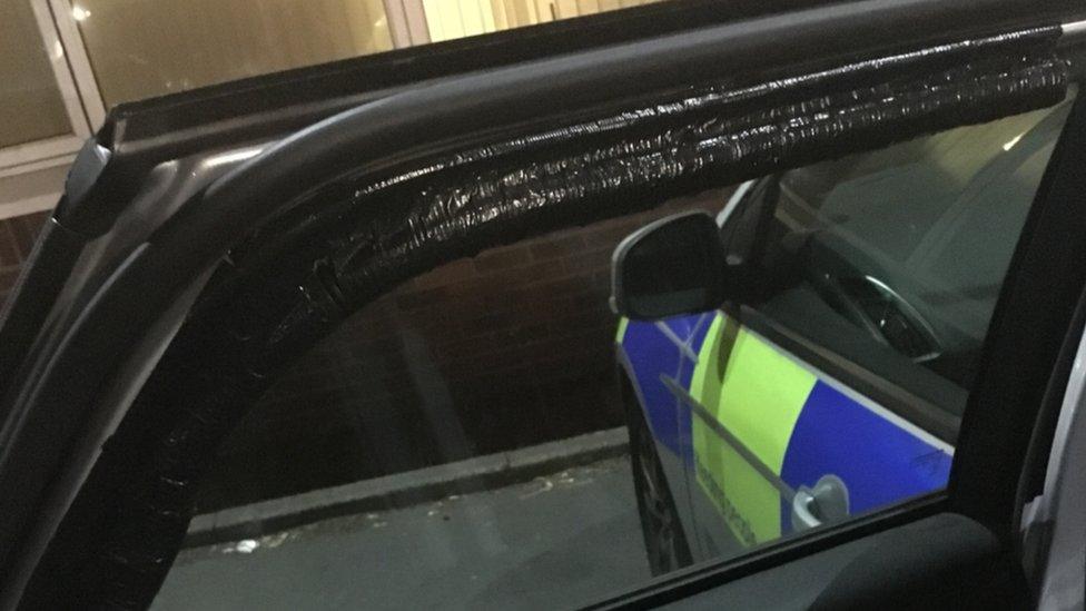 Duct tape on a police patrol car