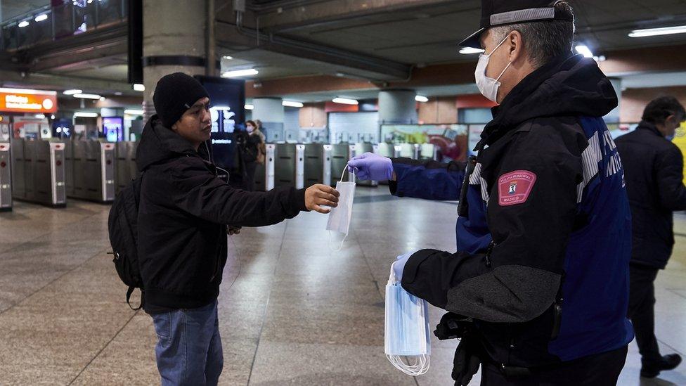 Masks being handed out in Spain