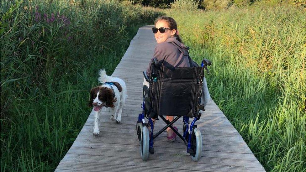 Libby in her wheelchair