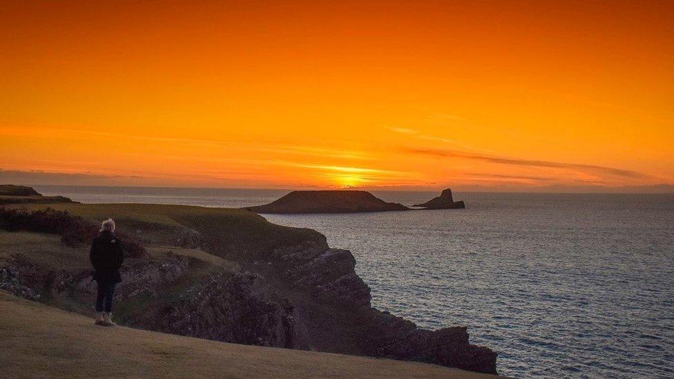 The sunset at Worm's Head on Gower