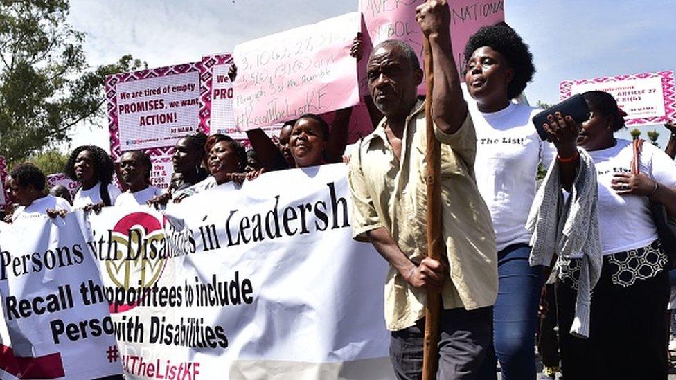 Activists demonstrate outside the parliament in Nairobi on February 08, 2018 to protest against the lack of adequate inclusion of women, youth and the disabled among nominees proposed by Kenyan President to his new cabinet.