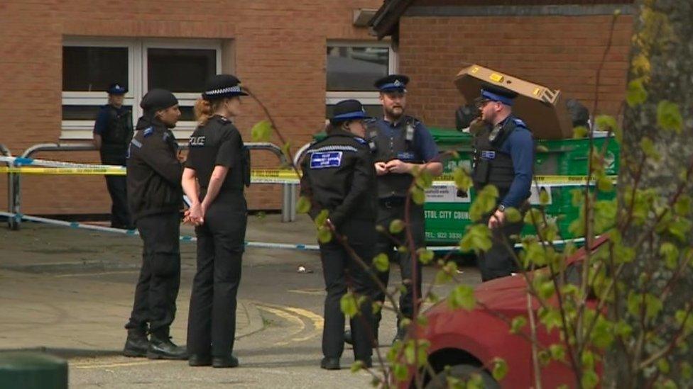 Police standing at Lansdowne Court