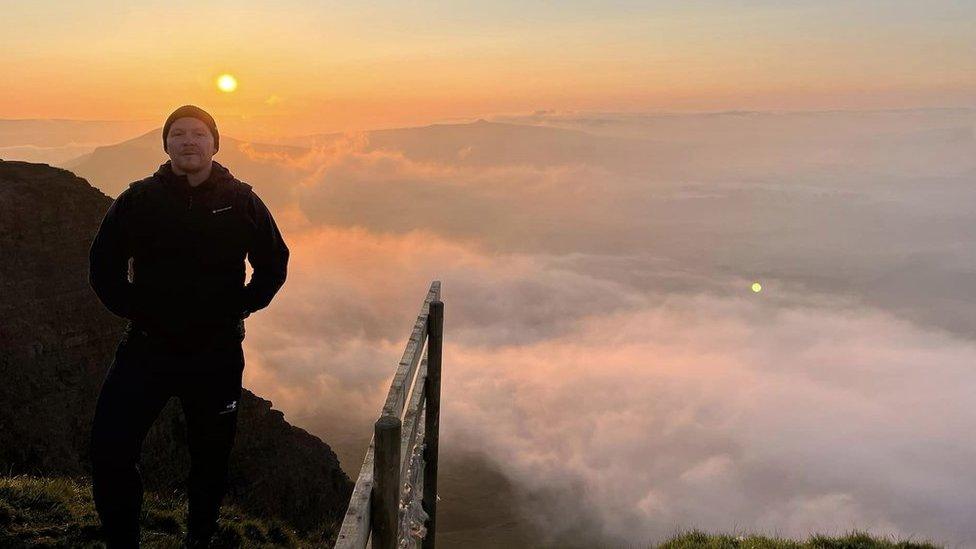 Danny Caldecott stood with a cloud inversion behind him