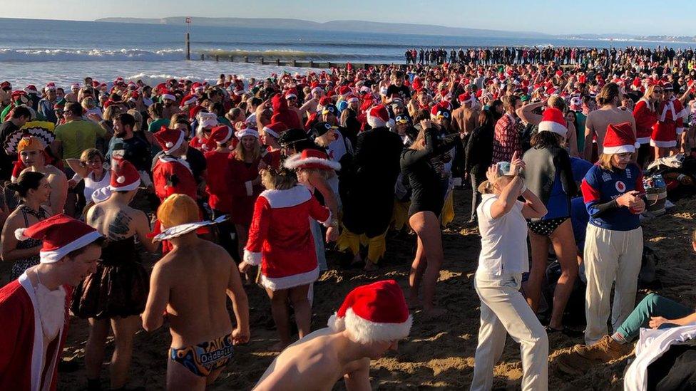 Christmas dip in the sea in Christchurch, Dorset.