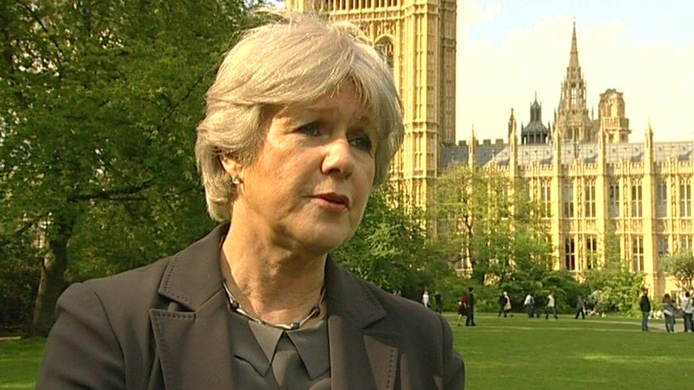 Ann Keen speaking in front of the Houses of Parliament during an interview on BBC News in 2009