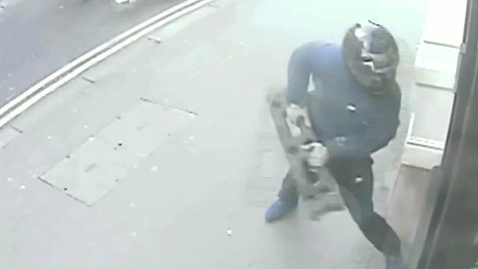 Robber breaking into Liverpool Street Jewellers