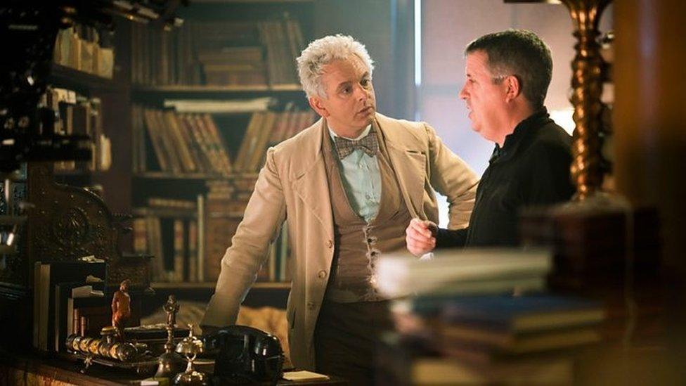 Doulas Mackinnon wit Michael Sheen on the set of Good Omens