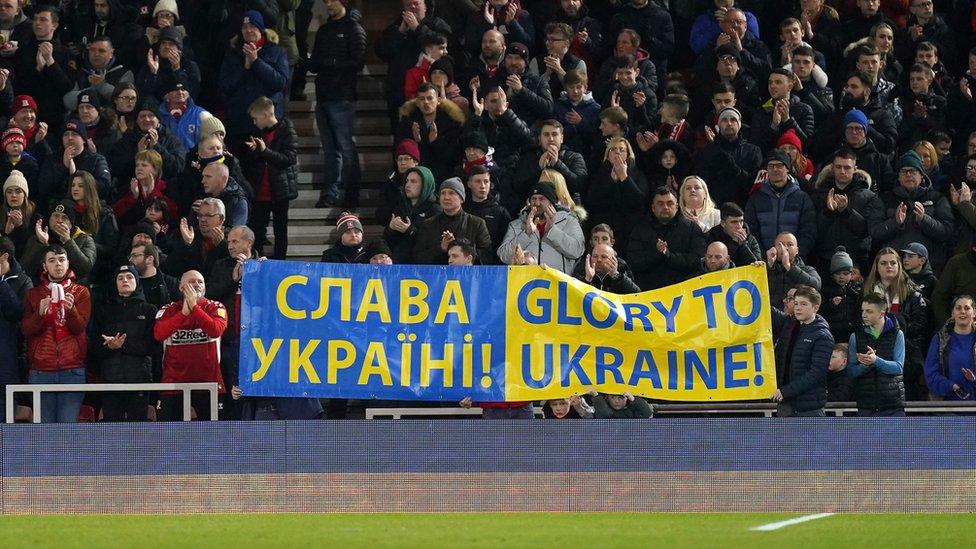 Middlesbrough fans hold sign supporting Ukraine