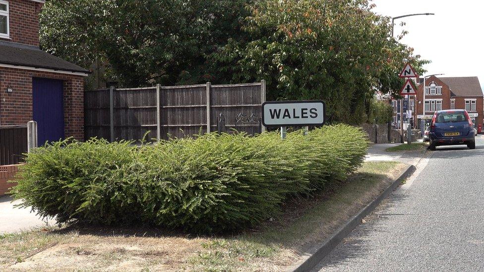 A road sign saying Wales