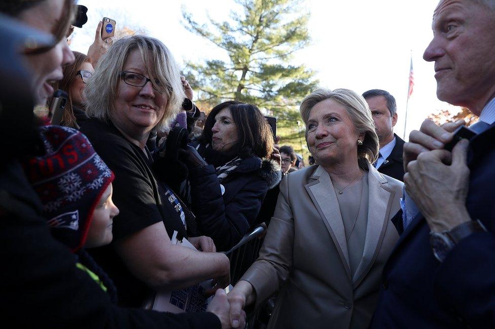 Democratic presidential nominee former Secretary of State Hillary Clinton greets supporters after voting at Douglas Grafflin Elementary School in Chappaqua, New York