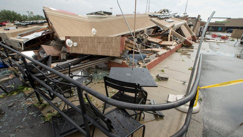 A Starbucks is demolished after an apparent tornado touched down in Kokomo