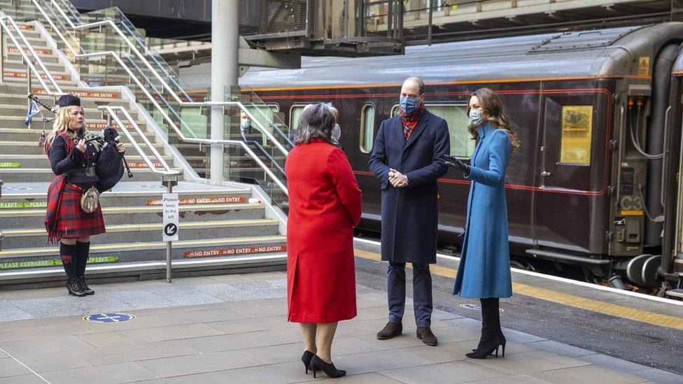 Kate and William are greeted by a piper in Edinburgh