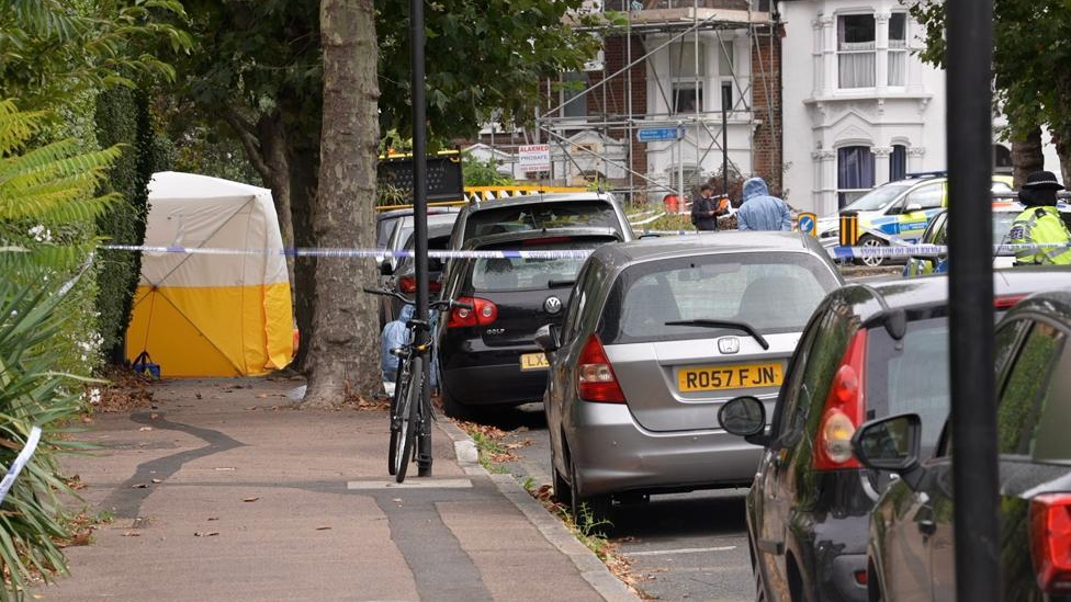 A police cordon is in place