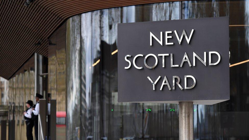 File photo of New Scotland Yard sign