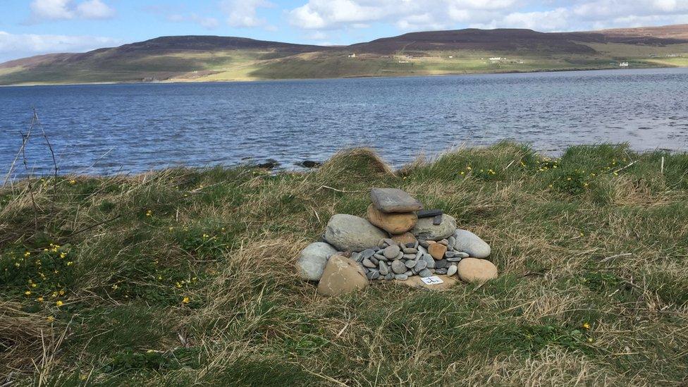 Cairn of stones by the coast