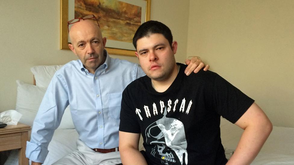 Antonio Rocolato with son Christopher in hotel room