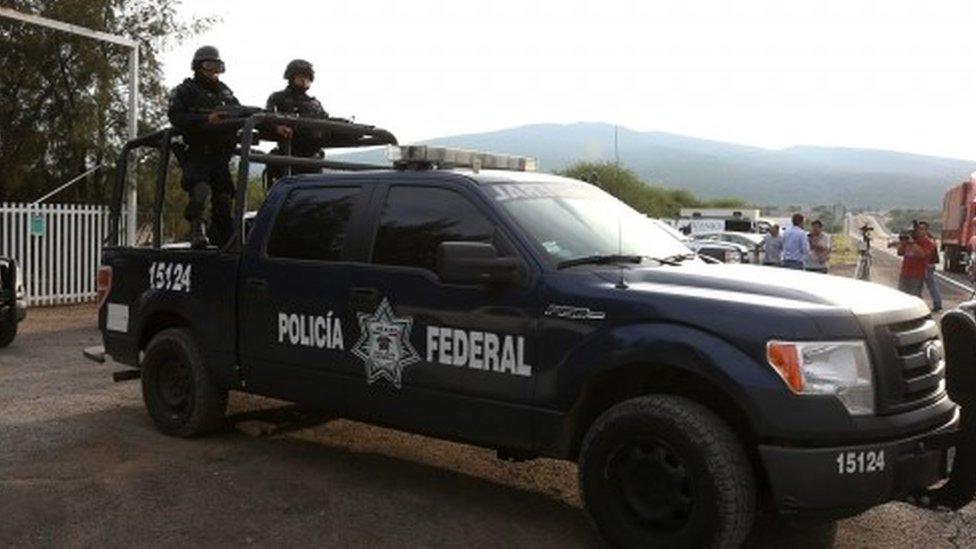 Federal Police leaving the ranch del Sol after a confrontation which ended with 43 people dead. 2015