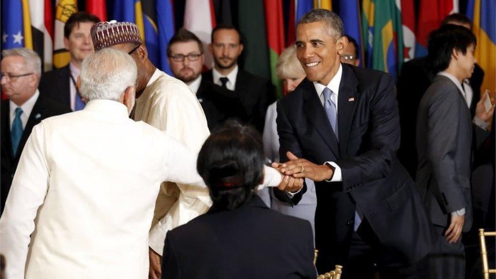 U.S. President Barack Obama and India"s Prime Minister Narendra Modi shake hands during the luncheon at the United Nations General Assembly in New York