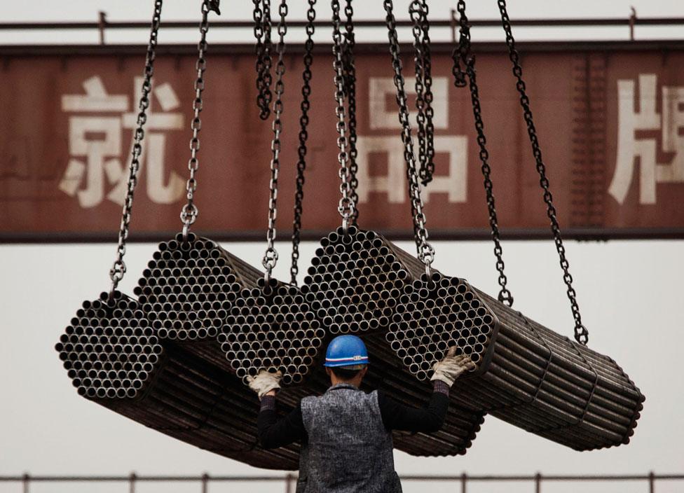 Steel rods being loaded at Tangshan steelworks