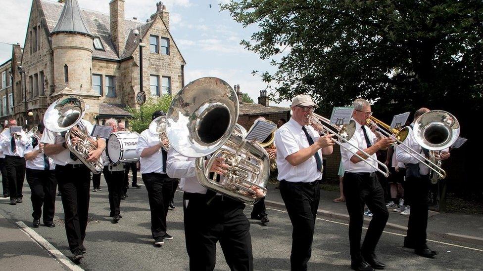 Stacksteads Brass Band in a carnival parade