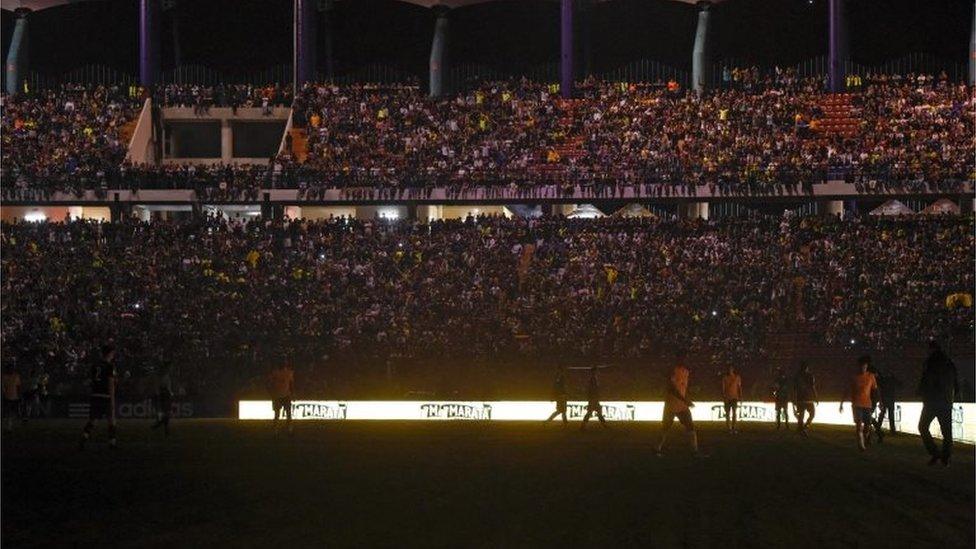 View of the field as a blackout occured during the Russia 2018 FIFA World Cup qualifier football match between Brazil and Venezuela, in Merida, Venezuela, on October 11, 2016.