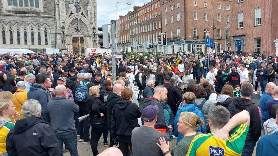 Protestors gather at Custom House