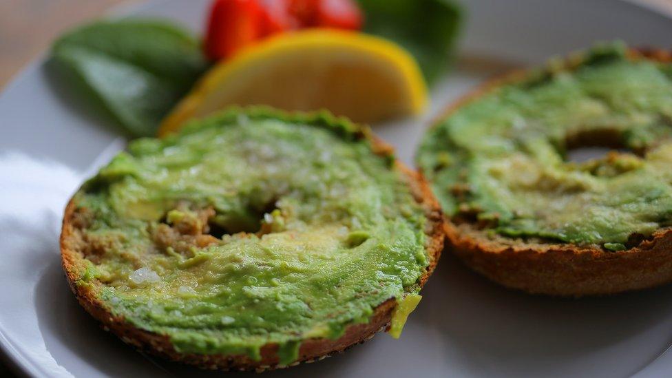 Mashed avocado on a bagel