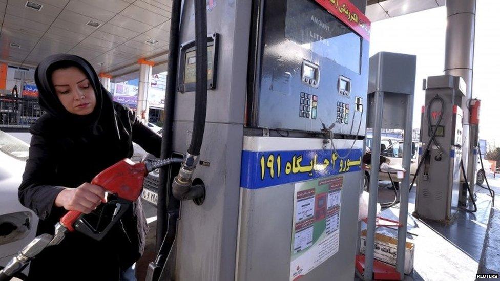 An Iranian women at the petrol pump