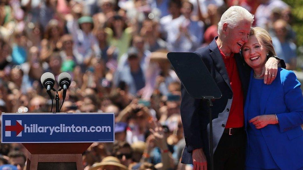 People cheer after Democratic Presidential candidate Hillary Clinton stands on stage with her husband former president Bill Clinton after her official kickoff rally at the Four Freedoms Park on Roosevelt Island in Manhattan on 13 June 2015 in New York City.