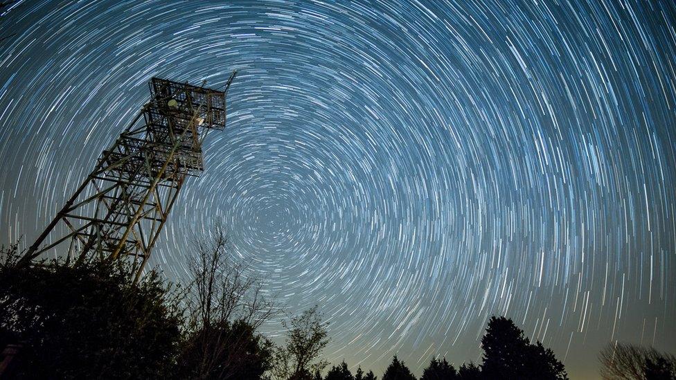 A stock image showing a time delayed swirl of Lyrid meteors, forming a circular pattern of light in the sky