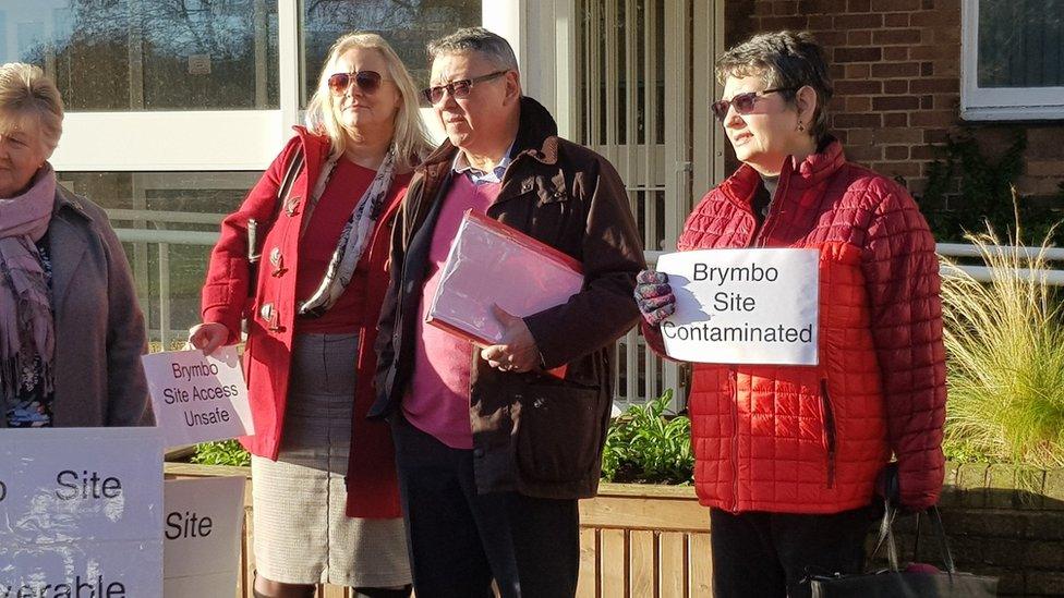 Protesters against a proposed gypsy and traveller site in Brymbo gather outside Wrexham's Guildhall