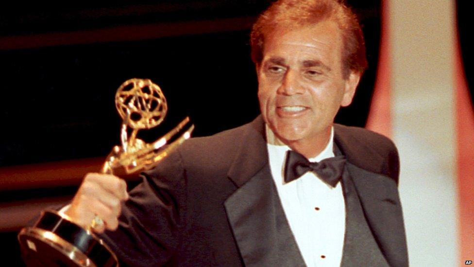 Actor Alex Rocco collects an Emmy in 1990