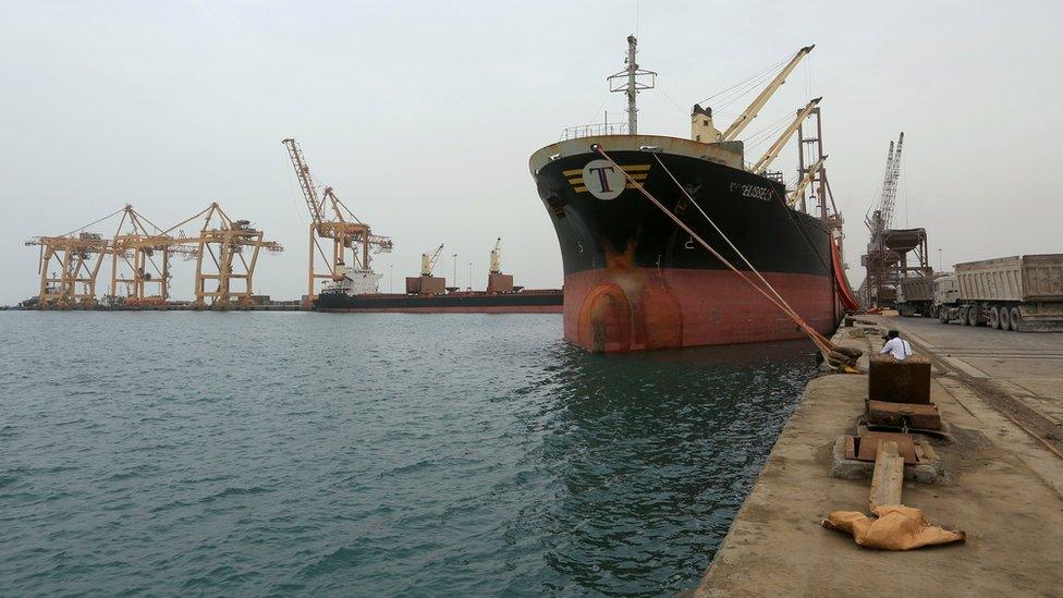 File photo showing a ship carrying grain docked at the Yemeni Red Sea port of Hudaydah (5 August 2018)