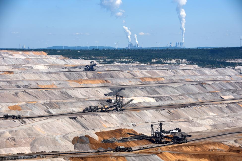 Mine with power stations in the distance