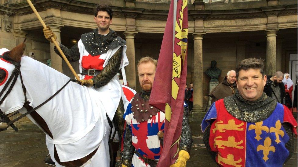 Men dressed as medieval knights