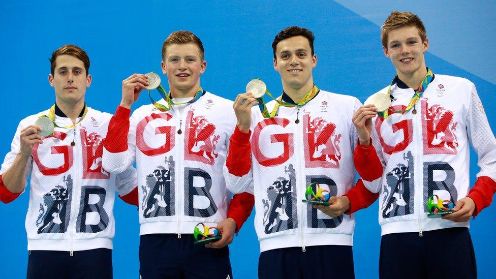 Chris Walker-Hebborn, Adam Peaty, James Guy and Duncan Scott with silver medals