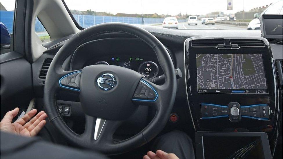 File photo dated 06/03/17 of Tetsuya Lijima from Nissan giving a demonstration around the roads of east London of a prototype Nissan Leaf driverless car.